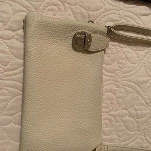 Small cross bag. Cream.  Looks new, in perfect condition. 8”x5”